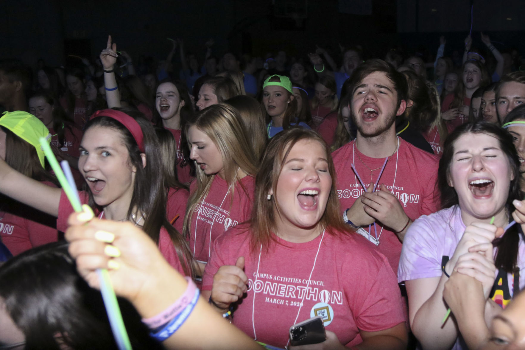 Students dance and sing